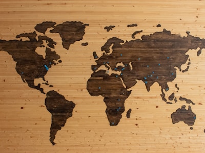 World map with airplane routes connecting different countries and universities